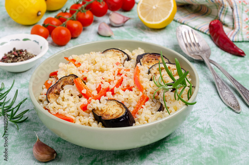 Bulgur with slices of fried vegetables