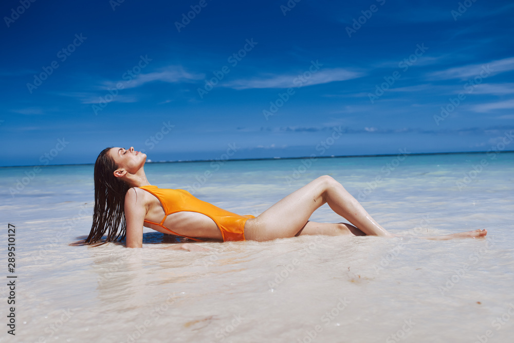 young woman in bikini on the beach