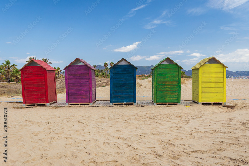Colorful changing houses on beach Colorful changing houses on beach