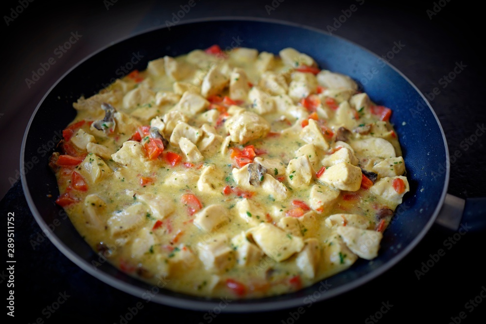 grilled chicken strips in curry sauce is ready to eat grilled chicken strips in curry sauce is ready to eat