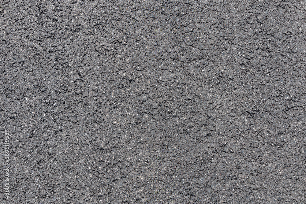 Texture of fresh pavement or asphalt lined up close. Flat lay. Texture of fresh pavement or asphalt lined up close. Flat lay.