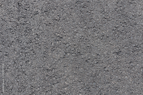 Texture of fresh pavement or asphalt lined up close. Flat lay.