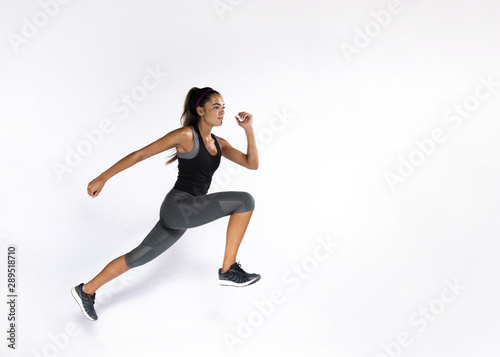 Full shot fit woman with white background