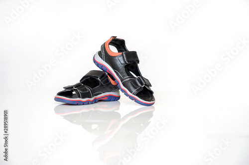 close up photo black sandals for boys