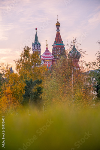 Zaryadye Park overlooking the Moscow Kremlin and St Basil's Cathedral, Russia. Zaryadye is a new tourist attraction of Moscow. Panoramic scenic view of the Moscow central park and garden in summer.