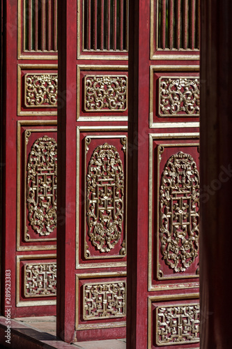 Detail of gates inside the Mandarin corridor in Hue, Imperial city an Unesco world Heritage in central Vietnam 