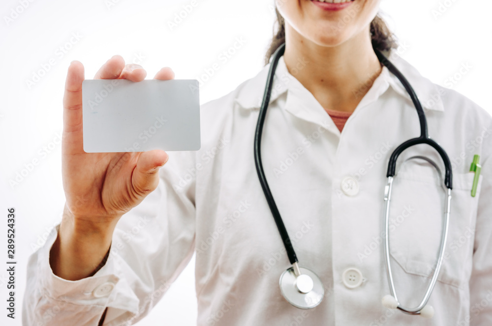 Doctor showing a blank health insurance card.