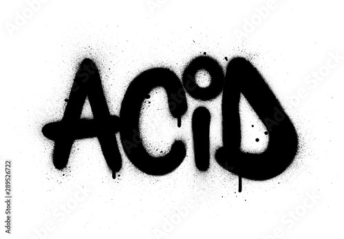 graffiti acid word sprayed in black over white