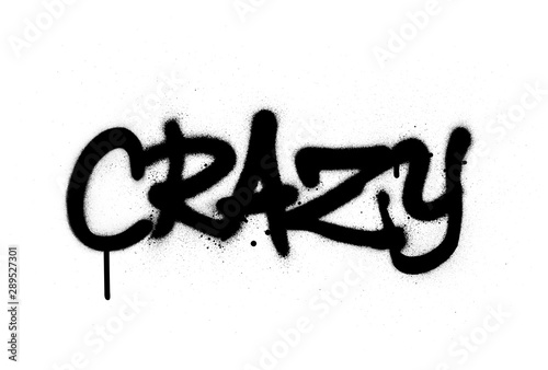 graffiti crazy word sprayed in black over white