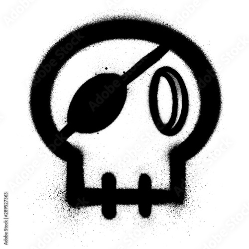 graffiti skull with an eye patch sprayed in black over white