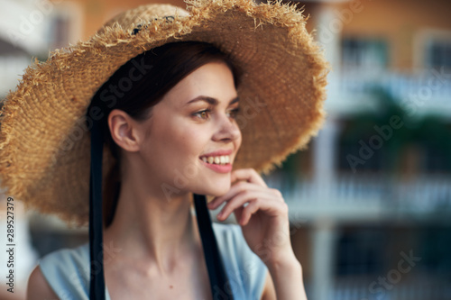 Cheerful woman in beach hats