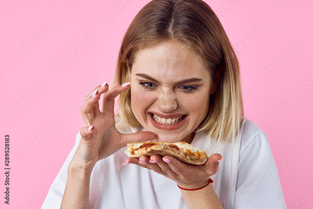 young woman with hamburger