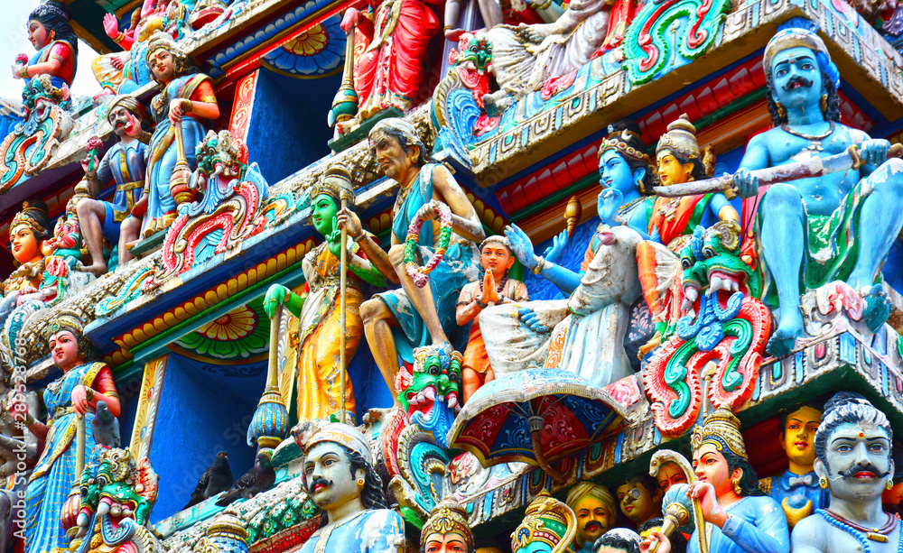 Colorful Hindu art and carvings on the facade of Sri Veeramakaliamman Temple in Little India, Singapore, Asia.