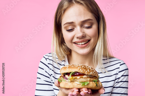 woman with hamburger