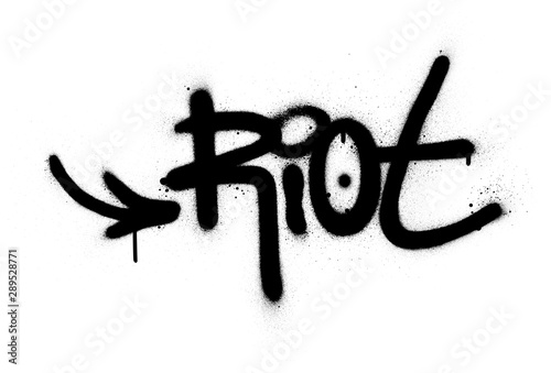 graffiti riot word sprayed in black over white
