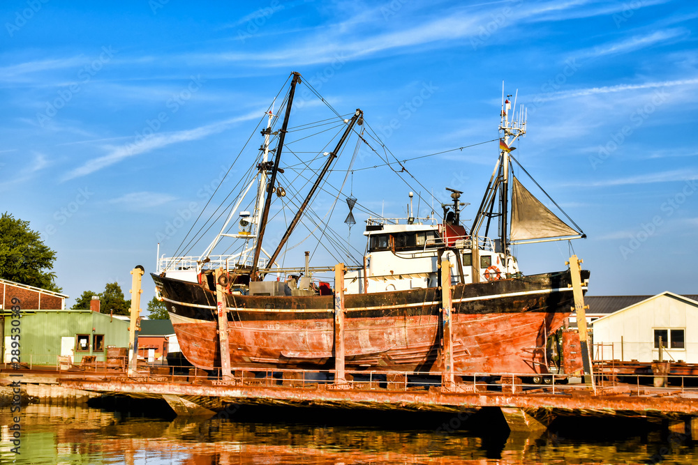 Fishing boat in a shipyard in Buesum on the North Sea in Germany