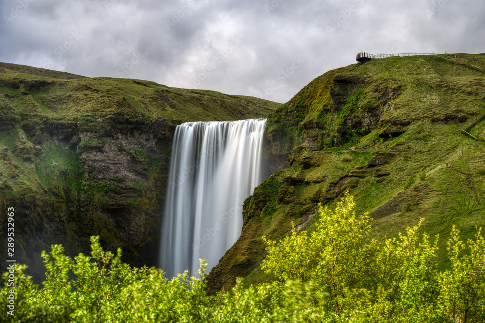 Fototapeta premium Long exposure photograph of skogafoss waterfall in spring