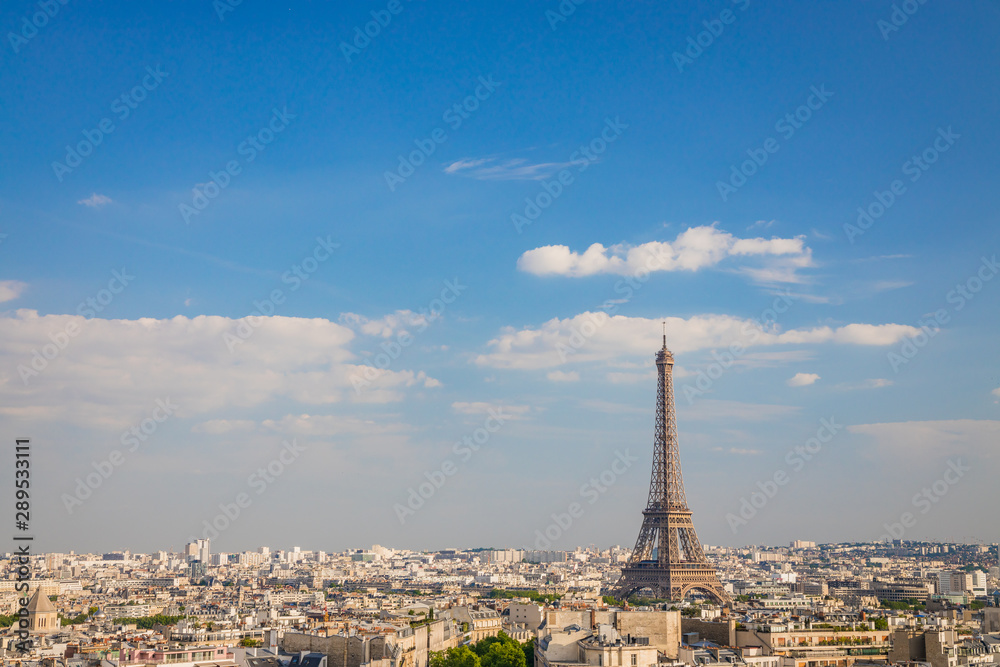 Paris skyline with the Eiffel tower on a sunny day