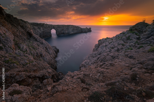 Famous Pont d'en Gil at the west coast of Menorca, Balearic Islands, Spain.