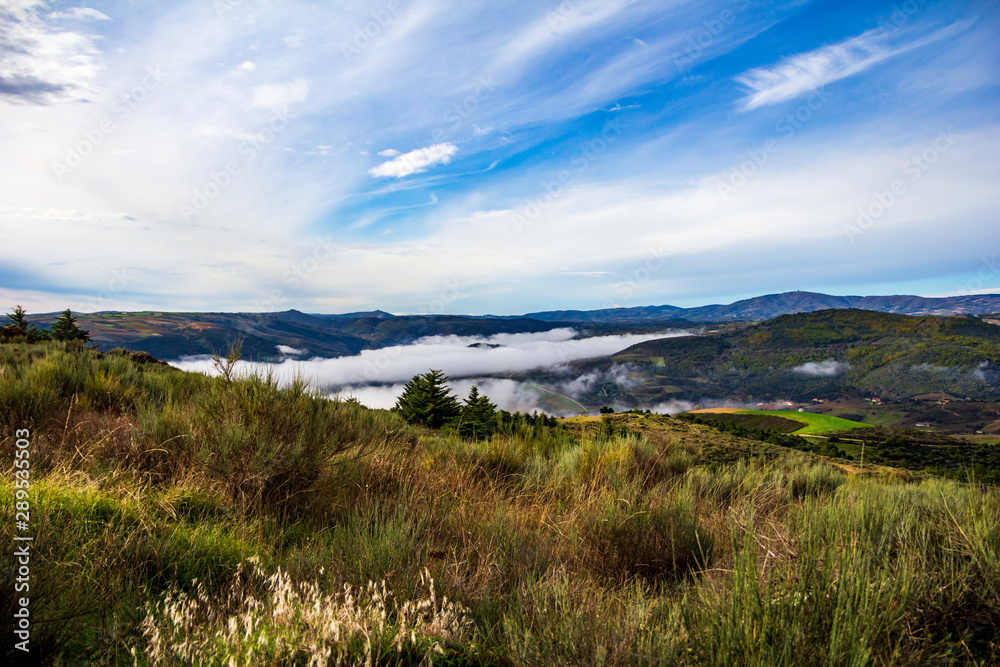 landscape with mountains and clouds