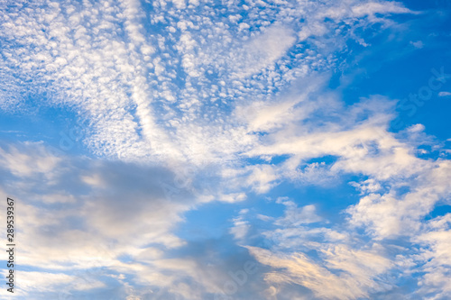 beauty high fluffy abstract clouds blue sky background fresh air in sunny day photo