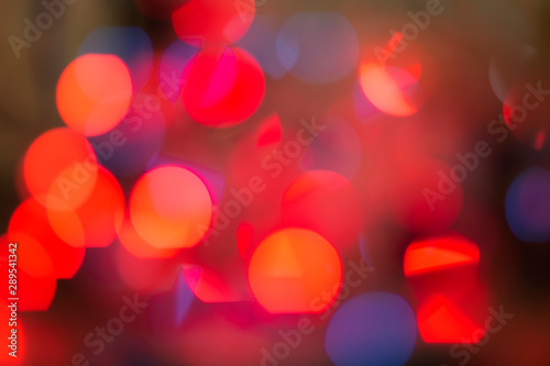 Red abstract bokeh from Christmas lights. Blur.