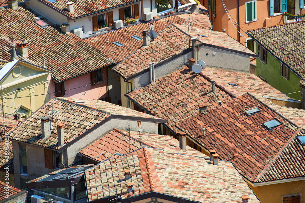Town of Malcesine. Above view of the tiled roofs of the Italian city. Lake Garda (Lago Di Garda), Italy