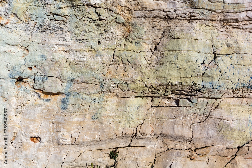 Fototapeta premium Rocky canyon beach with blue sea