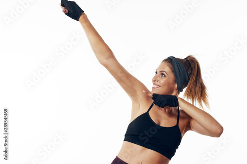 Fototapeta Naklejka Na Ścianę i Meble -  young woman doing fitness exercise