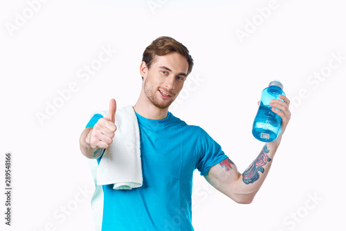 man with bottle of water isolated on white © SHOTPRIME STUDIO