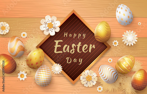 Happy Easter Greeting Card, Goldden Easter Eggs and white flowers on Wood Background,