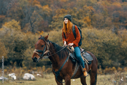 young woman riding horse © SHOTPRIME STUDIO