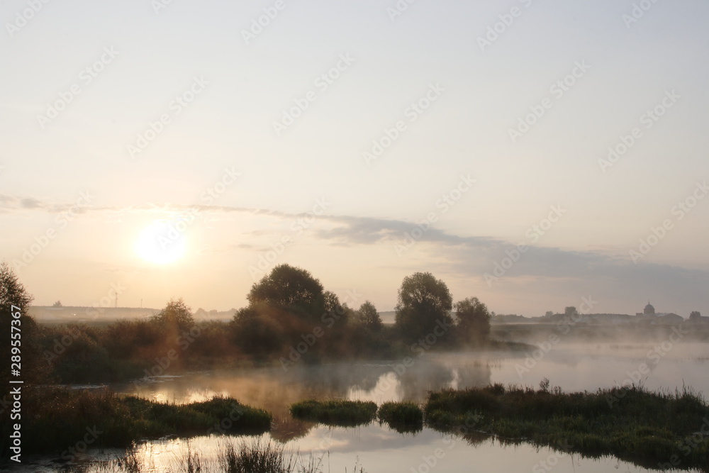 Early morning with light fog on the river