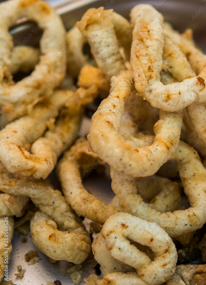 Delicious deep fried rings of squid close up. Delicious deep fried rings of squid close up.