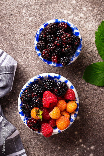 Red, black and yellow raspberry photo