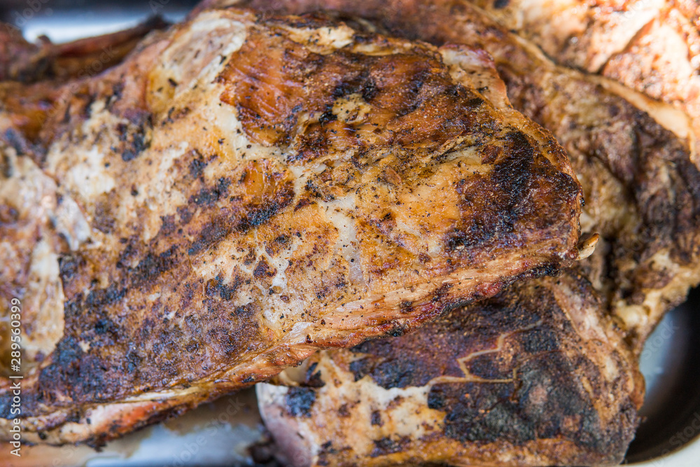 Cooking pork ribs on a grill. Meat on a grills. Cooking pork ribs on a grill. Meat on a grills.