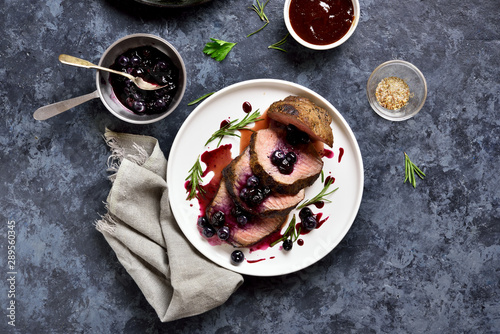 Grilled beef with blueberry sauce