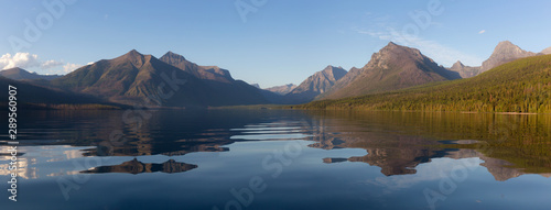 Beautiful Panoramic View of Lake McDonald with American Rocky Mountains in the background during a sunny summer day. Taken in Glacier National Park  Montana  United States of America.