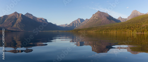 Beautiful Panoramic View of Lake McDonald with American Rocky Mountains in the background during a sunny summer day. Taken in Glacier National Park, Montana, United States of America.
