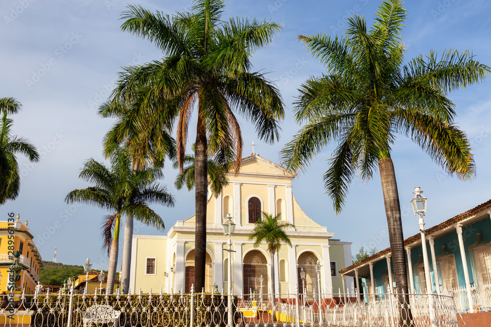 Beautiful View of a Catholic Church in Plaza Mayor during a colorful sunset. Taken in Downtown Trinidad, Cuba.