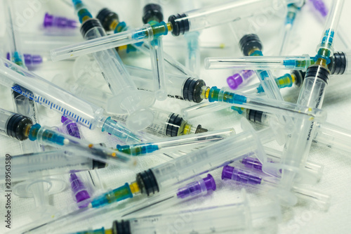 Syringe with needle, used syringes