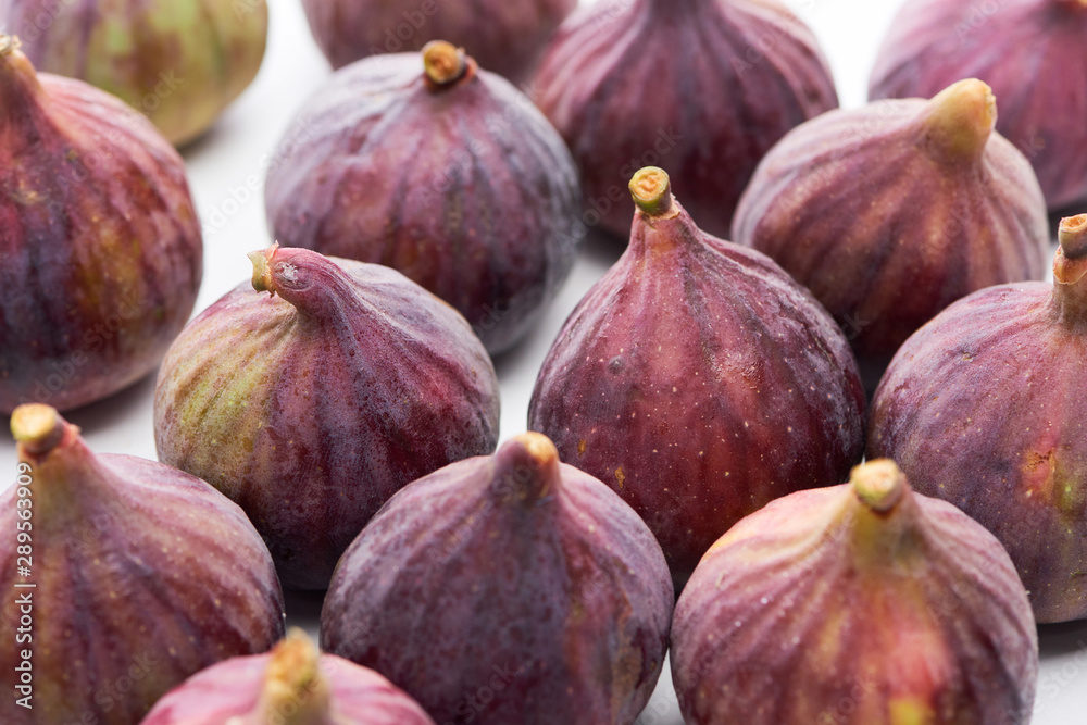 ripe whole delicious figs on white background ripe whole delicious figs on white background