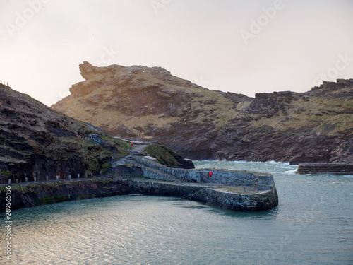 Wide angle view of Boscastle harbour during the calm blue hours at sunset. Cornwall, United Kingdom. Travel and nature. photo