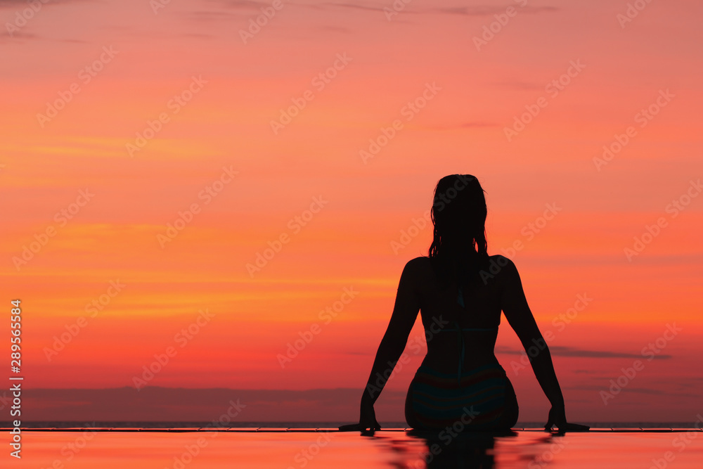 Photo of silhouette adult woman in profile on twilight background. Lonely  woman standing alone moments sunset. Style abstract shadows. Let's Stay  Toge Stock Photo - Alamy