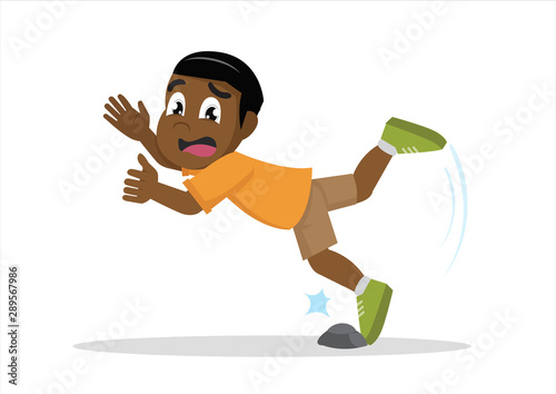 African Boy was stumbling on rock.