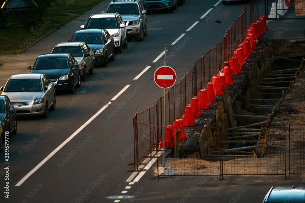 Inner city road closed by stop signs during repair