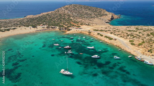 Aerial drone photo of paradise beach of Kalotaritissa with emerald clear sea, Amorgos island, Cyclades, Greece