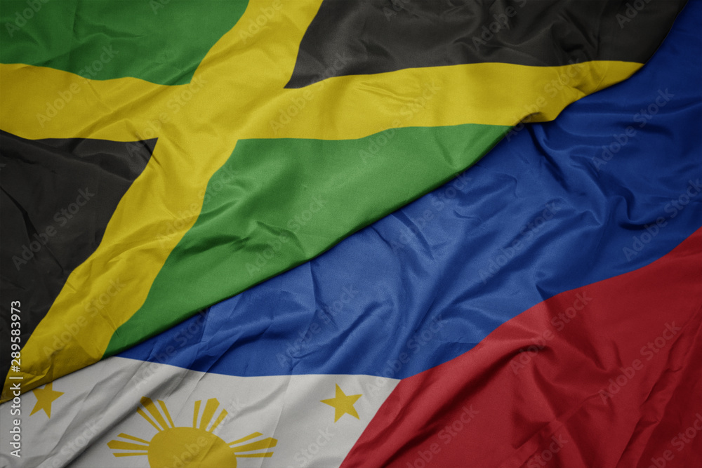 waving colorful flag of philippines and national flag of jamaica. waving colorful flag of philippines and national flag of jamaica.