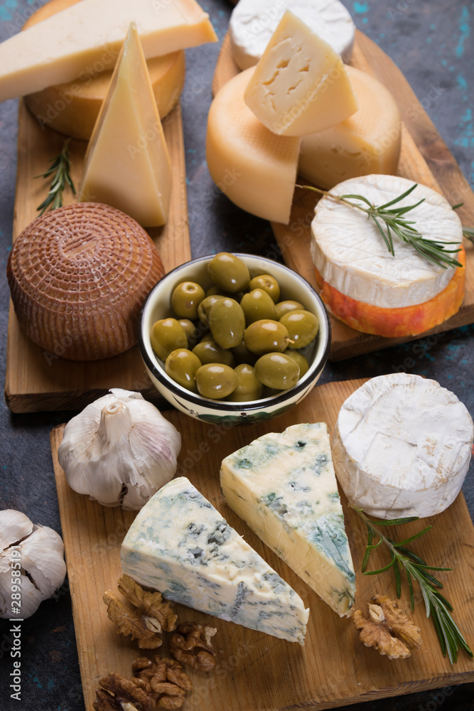 Fototapeta premium Aged cheese round and slices