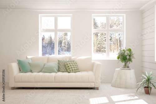 Stylish room in white color with sofa and winter landscape in window. Scandinavian interior design. 3D illustration